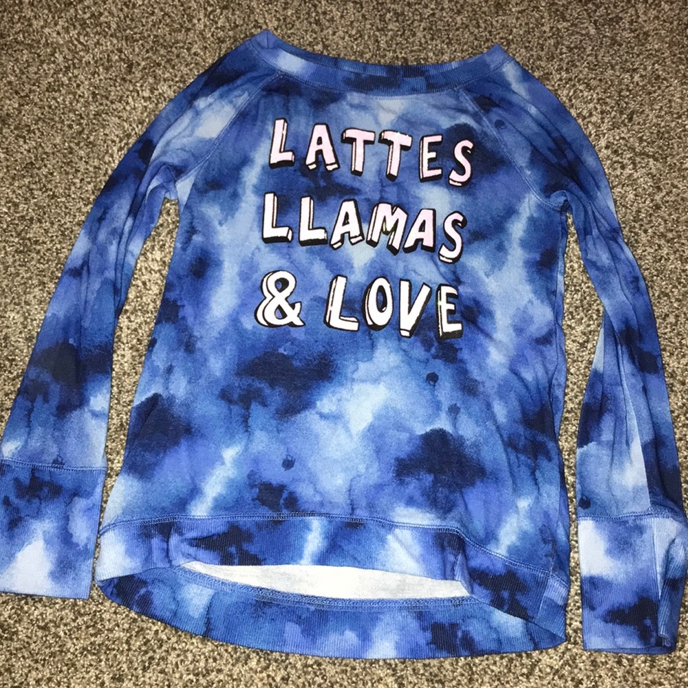blue shirt that says lattes llamas & love